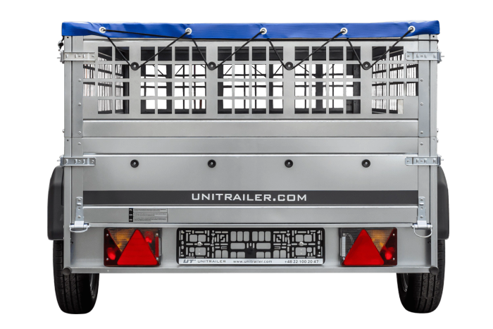 Einachsiger Anhänger auf Blattfedern 264×125 UNITRAILER GARDEN 264/R KIPP mit Gitterseitenwänden, H-0-Rahmen und blauer Plane-Neu